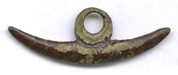 Roman copper alloy cosmetic pestle with suspension loop.