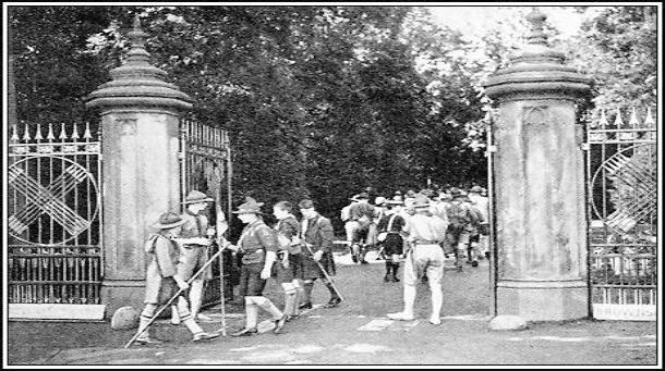 Scouts walking through the entrance to Arrowe Park at the 3rd Scout Jamboree 1929.