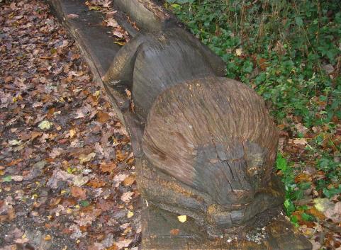 Tree trunk chiseled into a lion